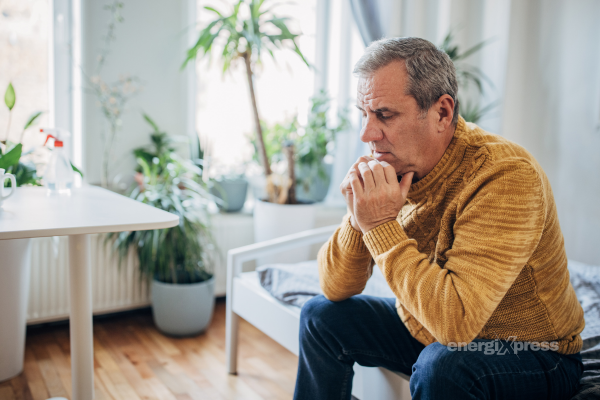 A man worried about his circulation, sitting on the couch